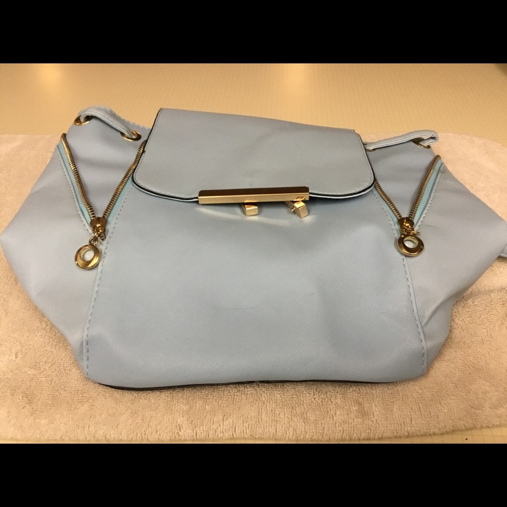 Fashionable handbag origin unknown mother passed inherited don’t know much about